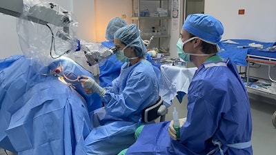 Vivian F. Kaul, MD, performing a procedure in Los Alcarrizos, Dominican Republic.
