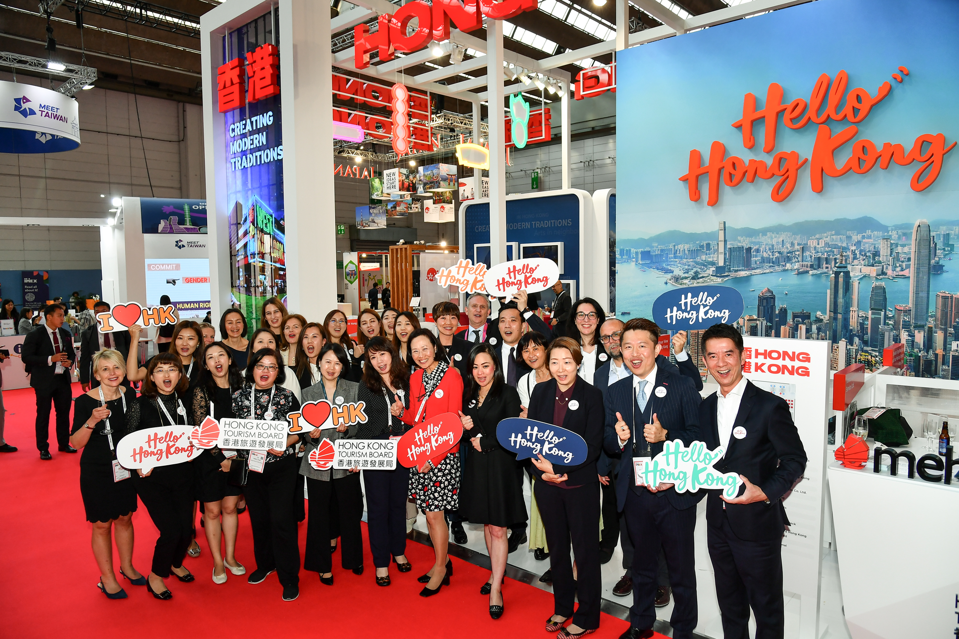 Hong Kong Tourist Board senior management and IAPCO council members line up on the Hong Kong stand to say hello.