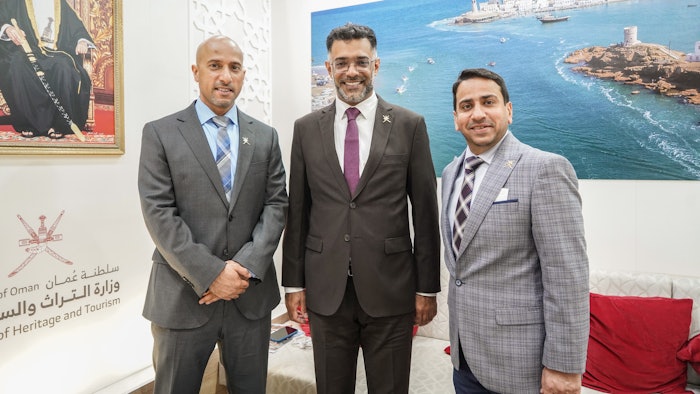 Said Salim Al Shanfari, CEO of Oman Convention & Exhibition Centre; His Excellency Azzan Al Busaidi, the undersecretary for tourism of the Sultanate of Oman; and Khalid Al Zadjali, director of Oman Convention Bureau, meet at the Oman stand at IMEX.