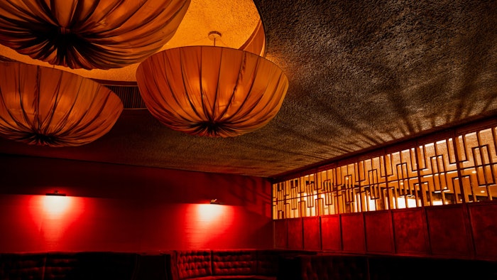 Guests enter The Red Room through an exclusive side entrance and down an evocatively lit stairway, entering a forgotten room seemingly shielded from time.