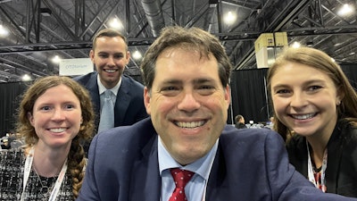 Daniel C. Chelius, Jr. (center), with three medical student colleagues at the AAO-HNSF 2022 Annual Meeting & OTO Experience in Philadelphia, Pennsylvania.