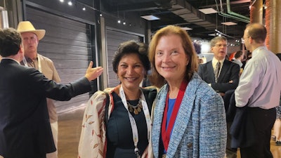 President Yaremchuk (right) with Cherie-Ann O. Nathan, MD, at the Presidents’ Reception.