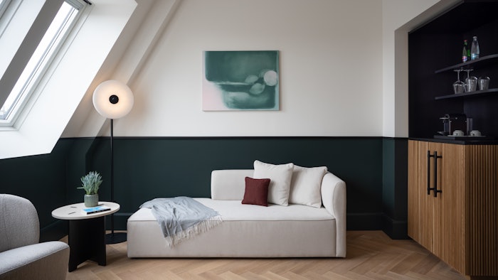 A renovated guest room at the Almanac X Alcron Prague features artwork by Alžběty Josefy.