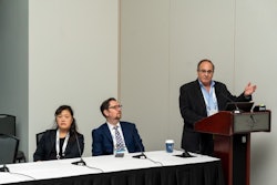 From left to right: Dr. Pham, Dr. Gold, and Dr. Stolovitzky (at podium).