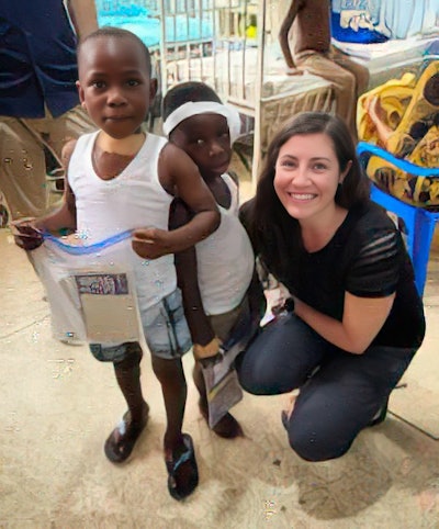 Dr. Highland with two pediatric patients post-operatively in the inpatient hospital.