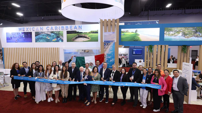 The Mexican Caribbean booth is officially open! Ray Bloom, chairman of IMEX Group, and Carina Bauer, CEO of IMEX Group, cut the ribbon to open the booth on Tuesday.