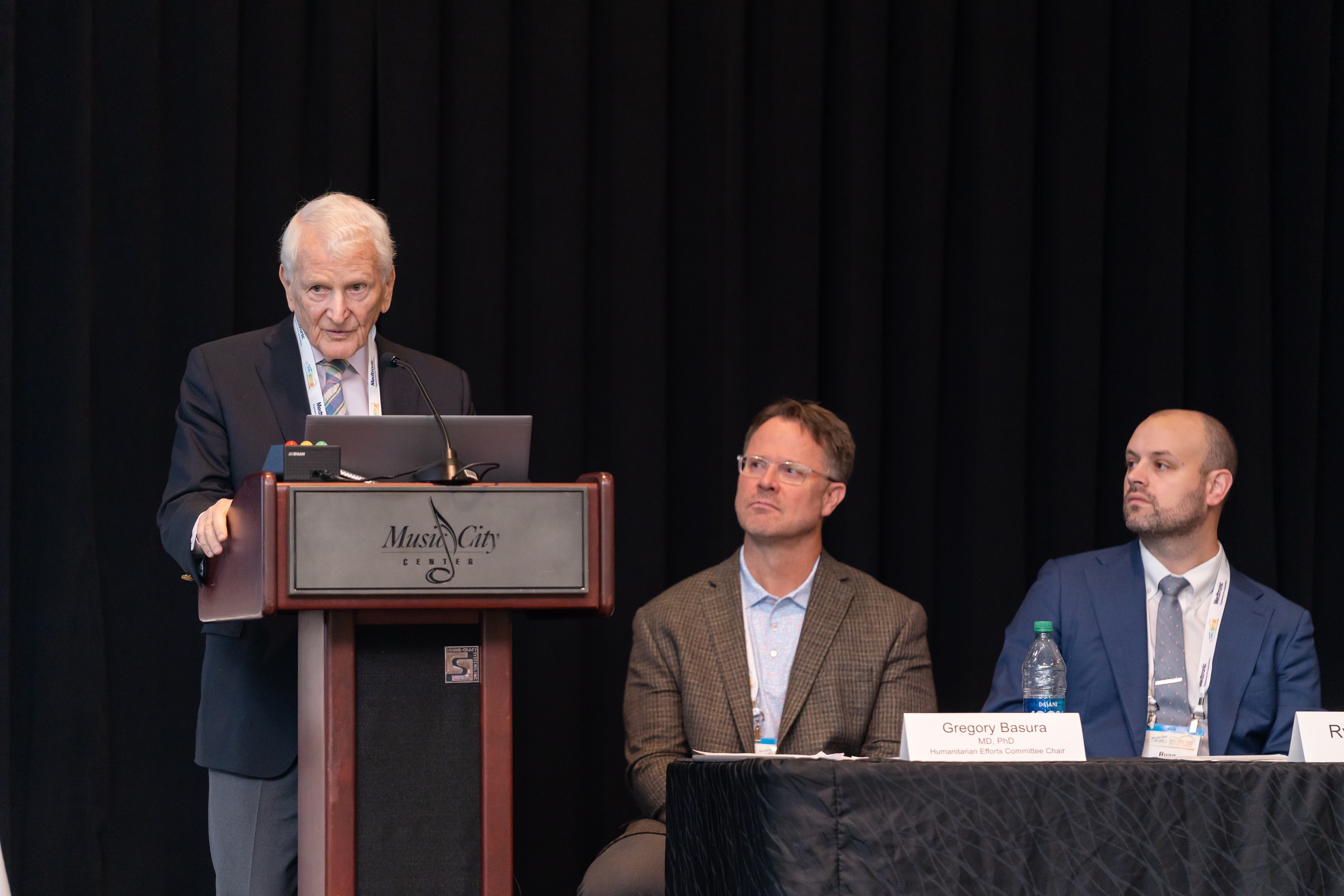 Eugene N. Myers, MD, FRCS Edin(Hon), at the Humanitarian Efforts Forum to launch Eugene N. Myers Global Education Fund. Featured with Humanitarian Efforts Committee Chair, Dr. Basura and Ryan H. Belcher, MD, MPH.
