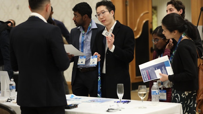 people networking at a table