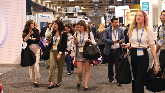 attendees visiting the Exhibit Hall.