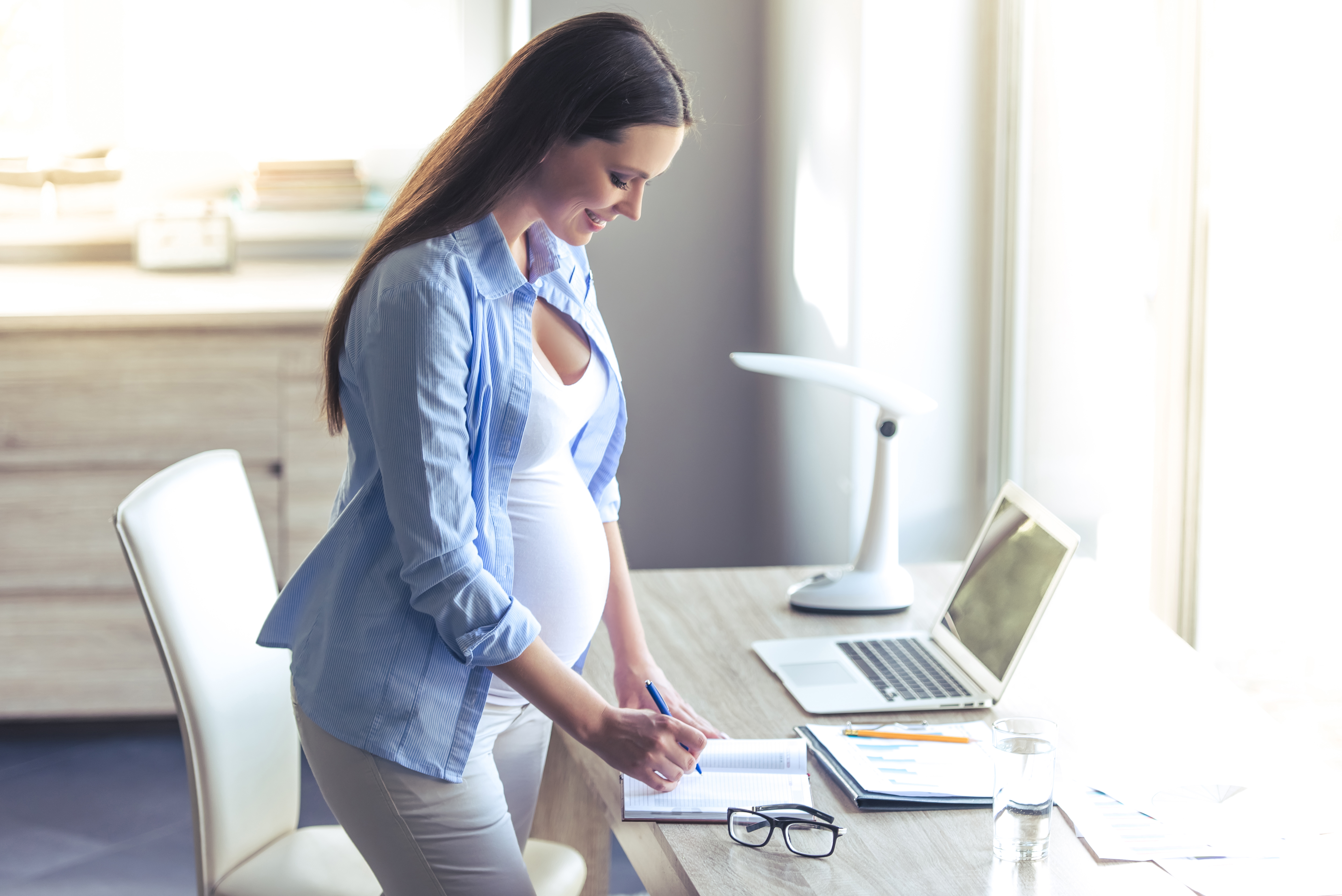 Pregnant Woman Working