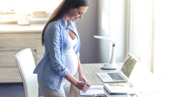 Pregnant Woman Working