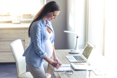 Pregnant Woman Working