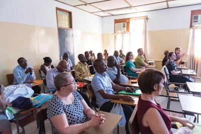 A study session during a visit of University of Michigan otolaryngologists to Ghana. Reproduced with permission from Michigan Medical.
