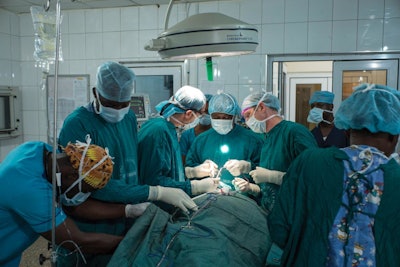 Surgery conducted during a visit of University of Michigan otolaryngologists to Ghana. Reproduced with permission from Michigan Medical.