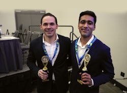 AAD's Resident Jeopardy winners display their tropies.