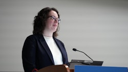 Callie Burgin, MD, FAAD speaking during session