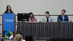 Panel of four dermatologists presenting at AAD session.