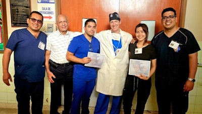 Dr. Ernesto Robles, local Peruvian orthodontist who works with FACES patients (far left) with FACES Medical Director Dana Smith, MD (fourth from left), and craniofacial surgeon/surgeons-in-training from Ecuador, Honduras, Panama, and Peru.
