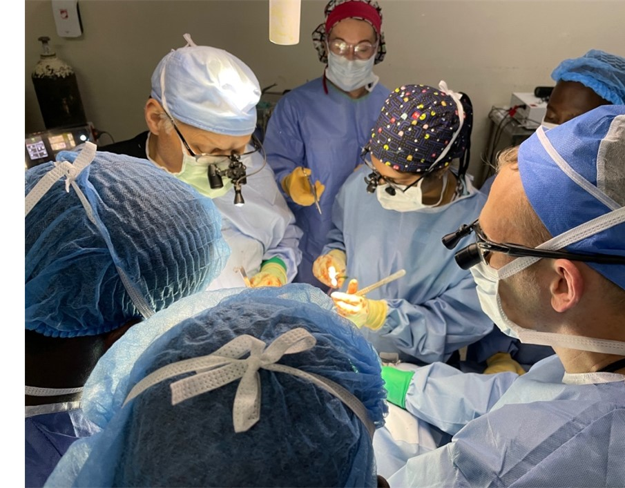 The author (Aarti Agarwal, MD) and colleagues taking part in a procedure on-site in Kampala, Uganda.