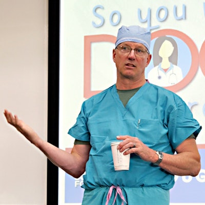 Douglas D. Backous, MD, speaks at a mentorship program at the Seattle Science Foundation in July 2024 to encourage underrepresented high school and college students to pursue medicine.