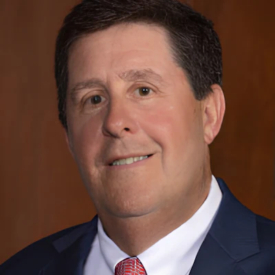 This is a photo of dermatologist Edward Brennan, MD, FACS who is speaking at AAD's Innovation Academy.