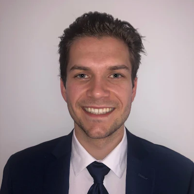 This is a professional headshot of medical student Julian Henke, who will be presenting at AAD Innovation Academy.
