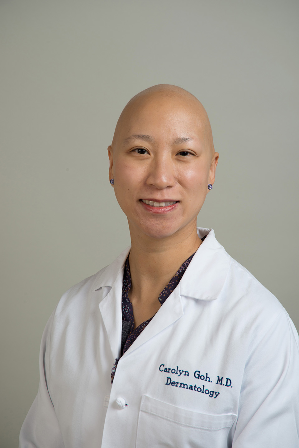 This is a professional headshot of dermatologist Carolyn Goh, MD, FAAD.
