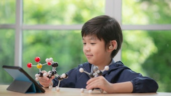 Child With Hearing Aid