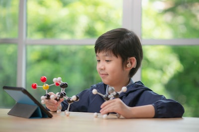 Child With Hearing Aid