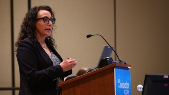 This is a photo of Eva Parker, MD, DTMH, FAAD speaking at AAD's Innovation Academy.