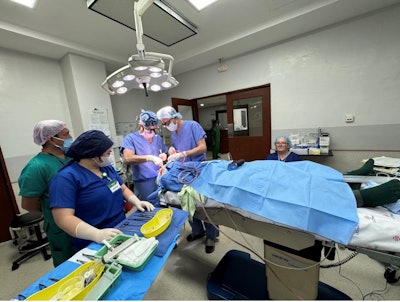 The care team performs one of many surgical procedures during their annual visit to Cebu, Philippines.