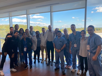 AAO-HNS physician members engaging with medical students to encourage their interest in otolaryngology.