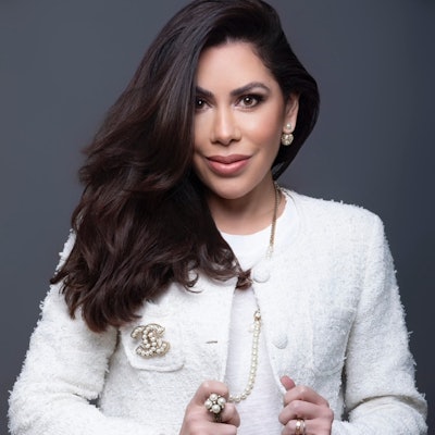 This is a photo of Suleima Arruda, MD, FAAD who is quoted in the article.