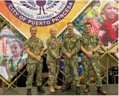 Members of the Pacific Partnership Cleft Lip and Palate Team. (Left to right) Commander Philip Gaudreau, MD, Colonel Kerry Latham, MD, Captain Eamon O'Reilly, MD, and Lieutenant Commander Tanner Miller, MD.