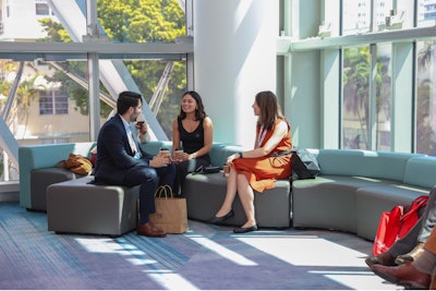 Attendees chat over coffee at the recent Annual Meeting & OTO EXPO in Miami Beach, Florida.