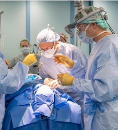Captain Eamon O’Reilly, MD, and Lieutenant Commander Tanner Miller, MD, performing a bilateral cleft lip repair.
