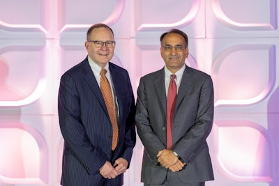 Outgoing EVP/CEO James C. Denneny III, MD (left), with Dr. Shah at the AAO-HNSF 2024 Annual Meeting & OTO EXPO.