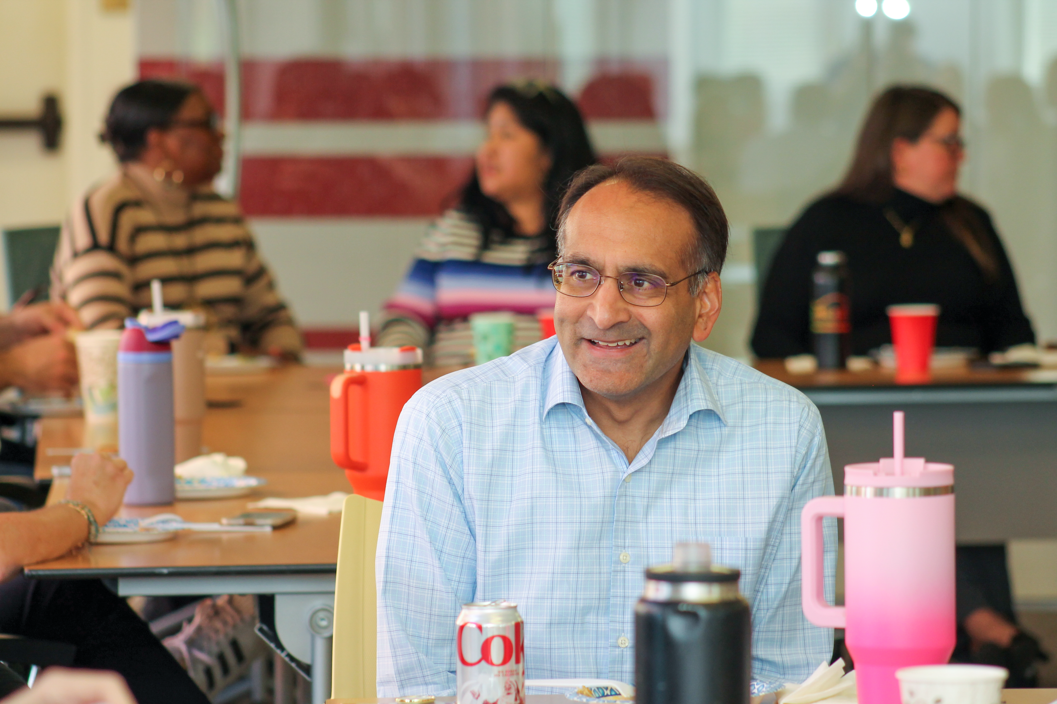 Dr. Shah and the Academy staff celebrate the holidays with a delicious potluck lunch.