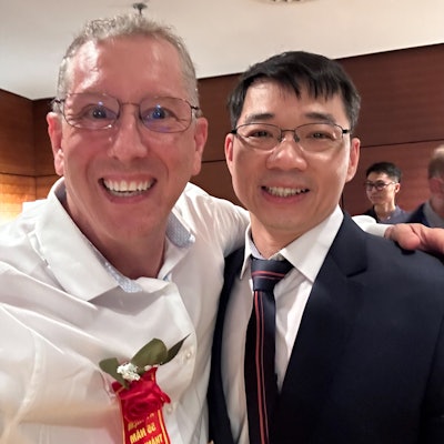 Dr. Pine and Dr. Lam celebrating the 55th anniversary of the National ENT Hospital.