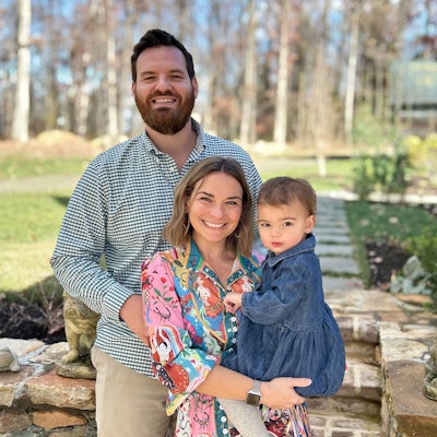 A family photo with husband Bryan and daughter Anna.