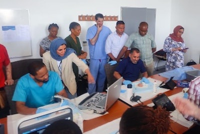 Author Maxwell Kligerman, MD, MPH, proctoring ultrasound-guided skills practice.