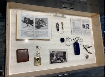 The evolution of the treatment of hearing loss. The display not only chronicles the historical progression of hearing aids but also emphasizes that each era’s solutions were built along the insights and challenges that preceded them.