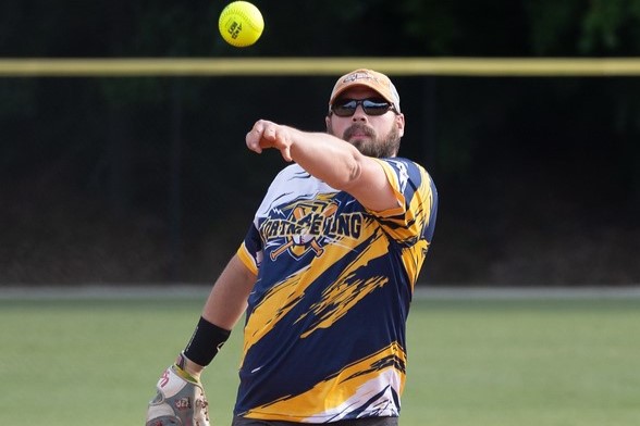 Jacob pitching in a softball tournament in Raleigh, North Carolina.