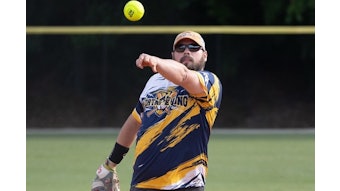 Jacob pitching in a softball tournament in Raleigh, North Carolina.