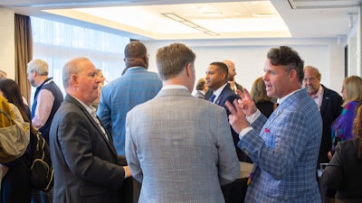 Attendees at the ENT PAC Investors Reception discuss the future of otolaryngology advocacy.