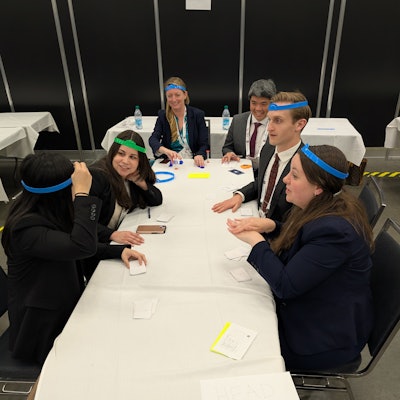 Participants at the AAO-HNSF 2025 Annual Meeting & OTO EXPO escape room experience.