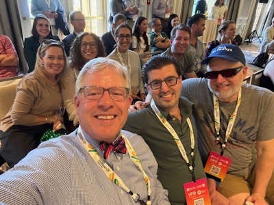 Dr. Brown with the University of South Florida team during the FCOM Academic Bowl.