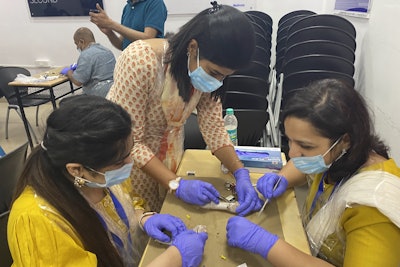 Trainees receive surgical simulation experience using an animal larynx to perform airway reconstruction.