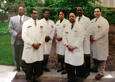 1998 Black residents and fellows, left to right: Drs. Charles Greene, Larry Myers (fellow), Rodney Taylor, Oneida Arosarena, Monte Harris, Charles Boyd (fellow), and David Brown. Missing, Dr. Claudell Cox.