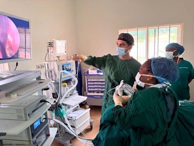 Dr. Amoo-Quaye and Dr. Bellamkonda working through an endoscopic sinus surgery.